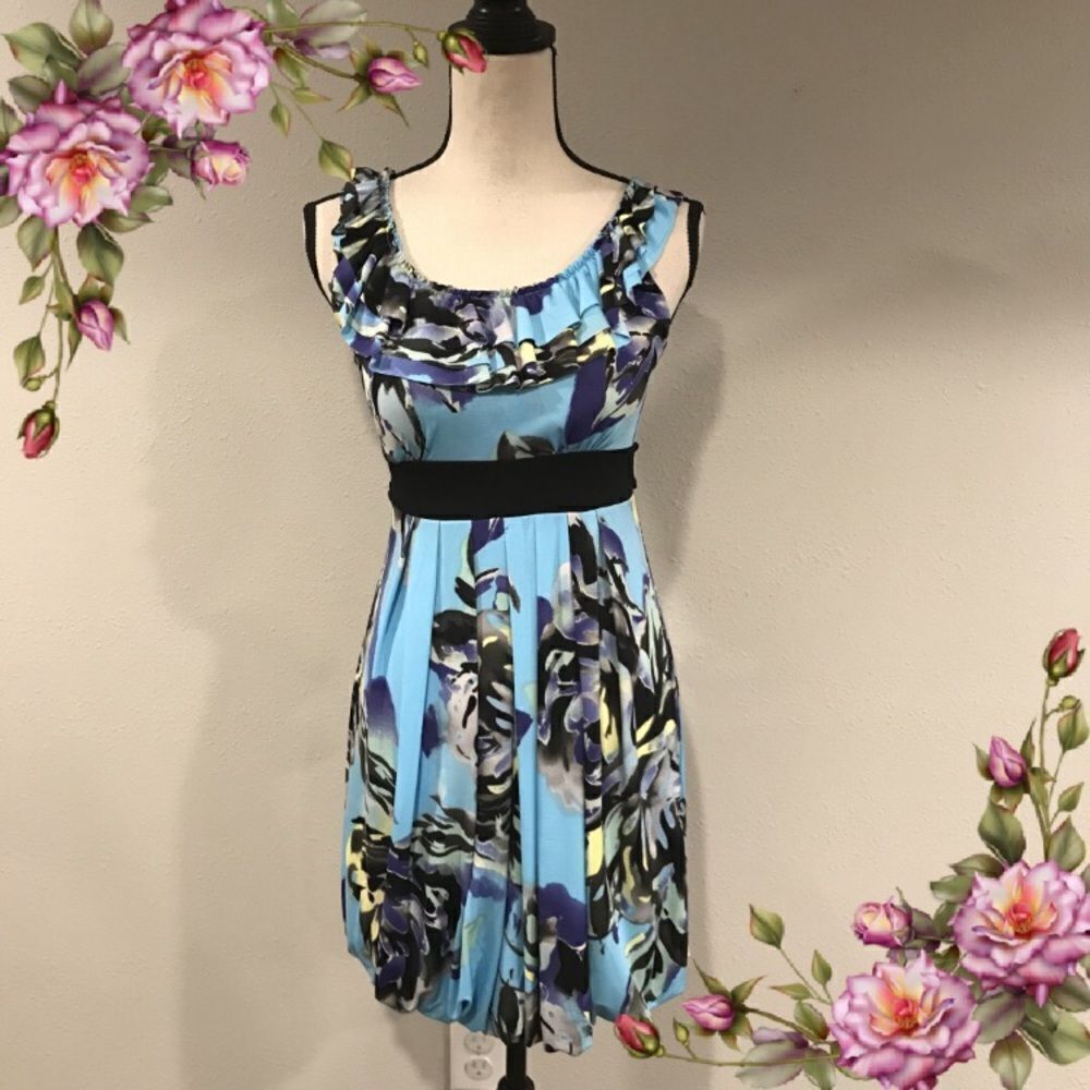Candie’s floral sleeveless dress ties up in the back‎